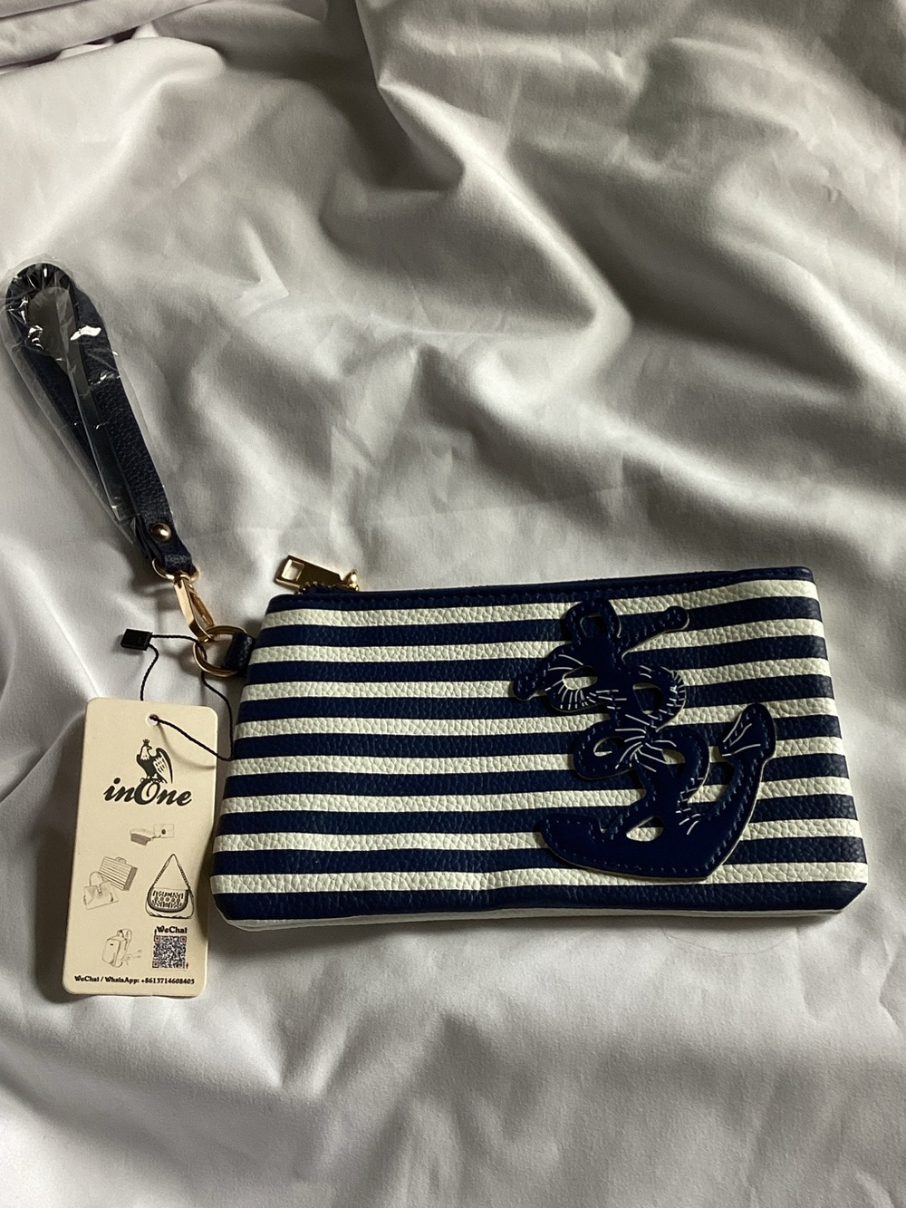 inOne Navy and White Striped Wristlet Clutch with Anchor Accent